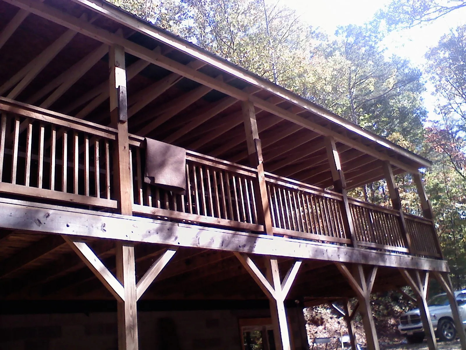 Timber framing under a new elevated porch and deck — Roof Leak Repair in Calvin by Roofing Brothers